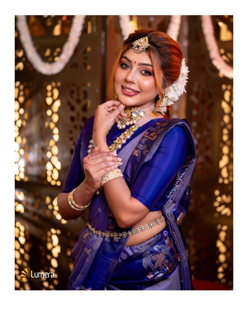 Model in a blue saree during a Tamil cultural portrait photoshoot in Jaffna, photographed by Lumera Studio.